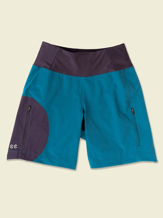 Blue shorts with circular purple color block and nightshade purple waist band laydown