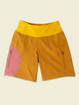 Buckthorn brown shorts with Aragon pink circular color block and bright yellow yoga waist band laydown