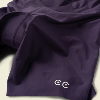 Nightshade purple padded shorts made of comfy, stretchy and soft wicking polyester fabric with the clean and white eyes logo
